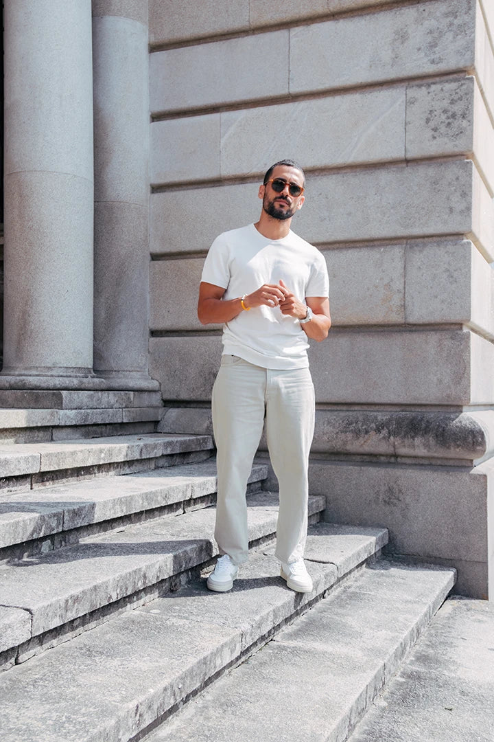 MODEL_WEARING_MANIMAL_WHITE_VEGAN_SNEAKERS