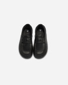 black barefoot loafer beflamboyant sky view