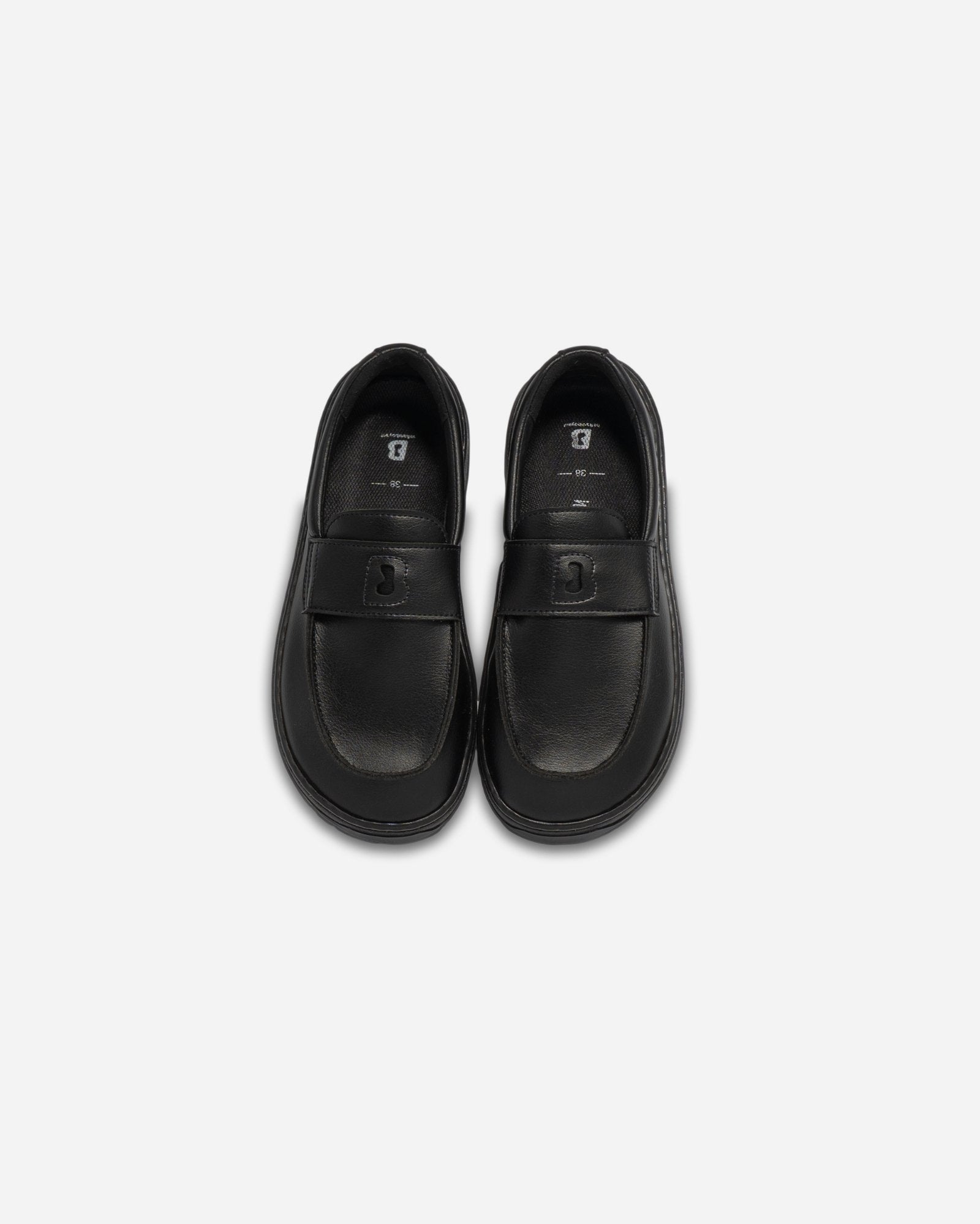 black barefoot loafer beflamboyant sky view